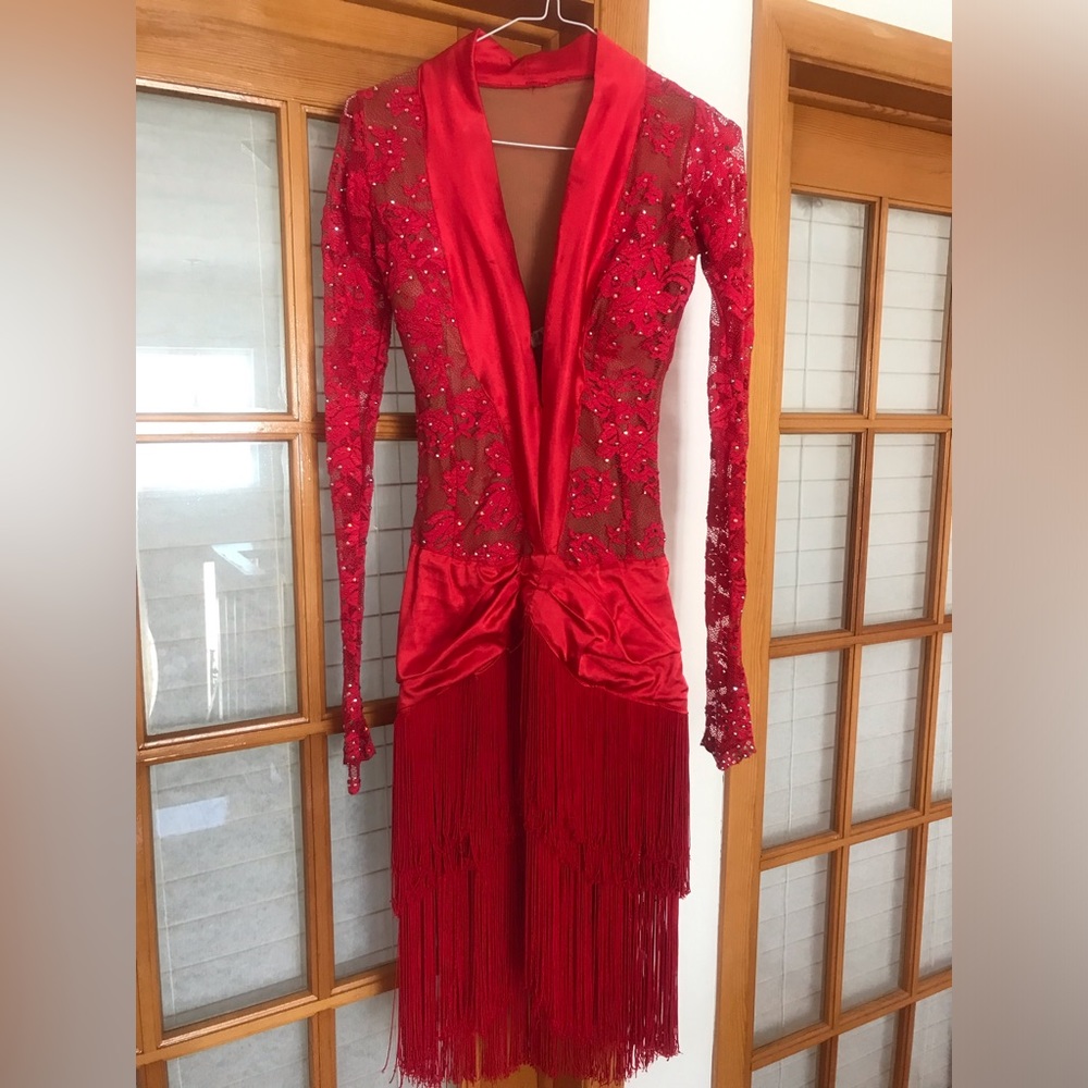 Red lace with rhinestones and cups and body built in snd fringes dance dress